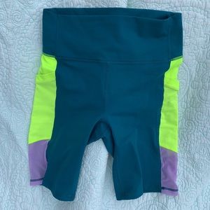 Fabletics Powerhold Colorblock Biker Shorts with Pockets